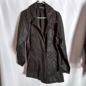 Mycra Pac designer raincoat